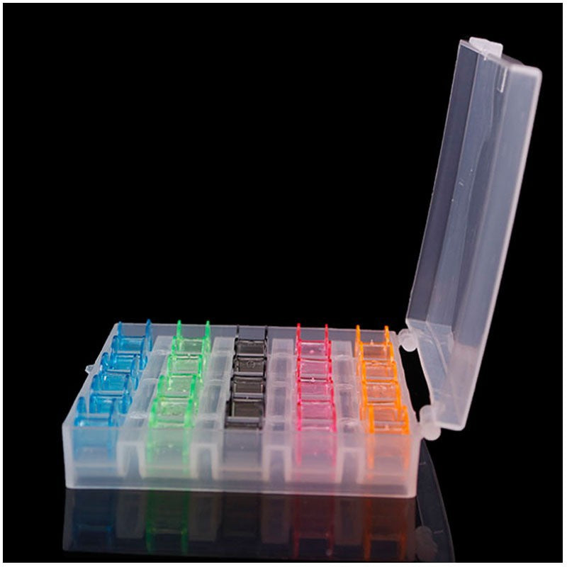 Clear plastic storage box with colorful compartments on a black background