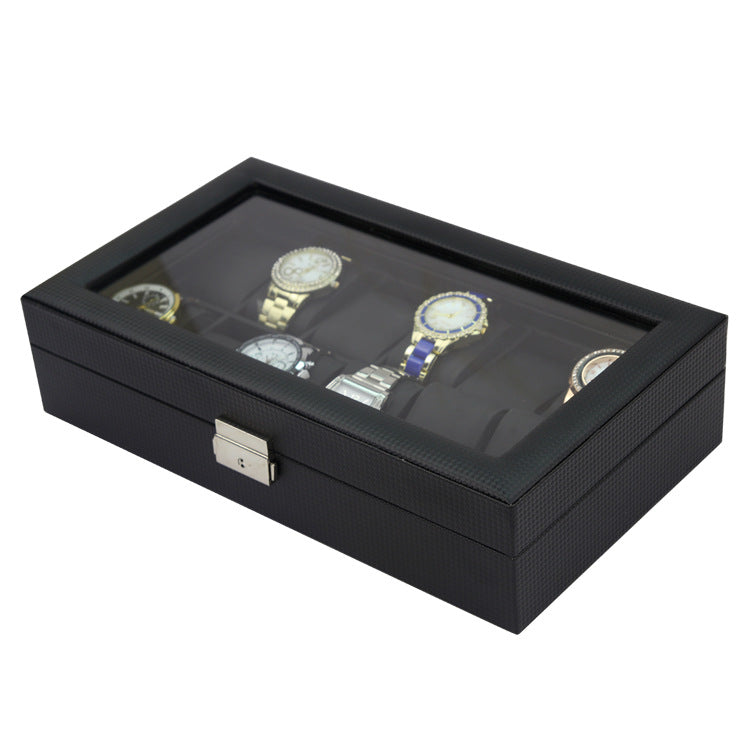 Black jewelry box with six watches displayed on a white background