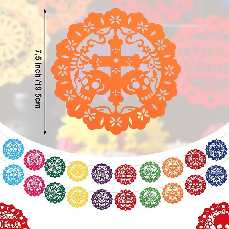 Colorful papel picado banner garlands with skull and floral cutout designs, shown in multiple colors on a white background with a large orange sample and a dimension marker of 7.5 inch (19.