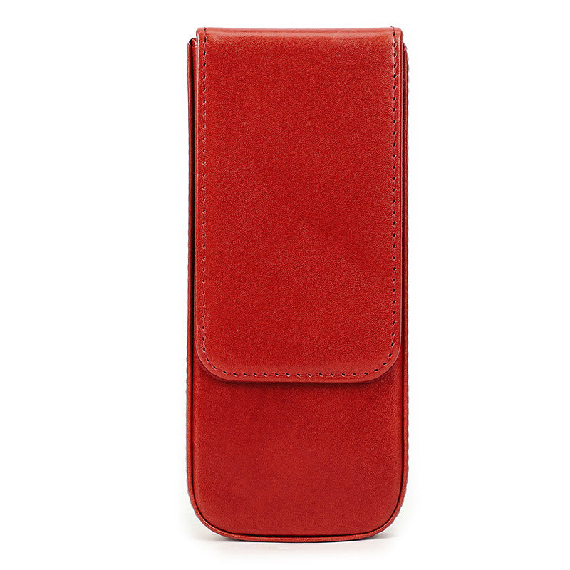 Red leather pen case on a white background