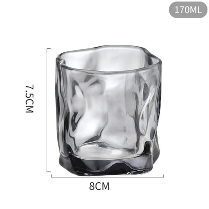 Black glass tumbler with dimensions on a white background