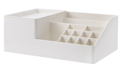 Cream makeup organizer with multiple compartments on a white background