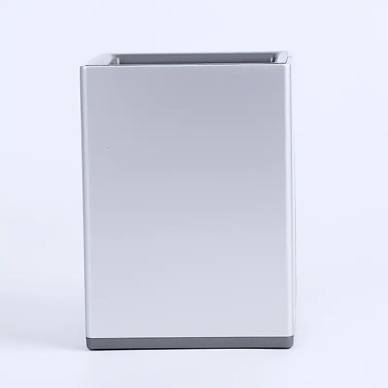 Rectangular metal pen holder on a white background