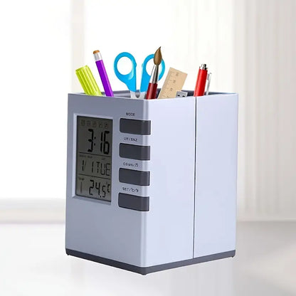 Pencil holder with digital clock and calendar on a white background