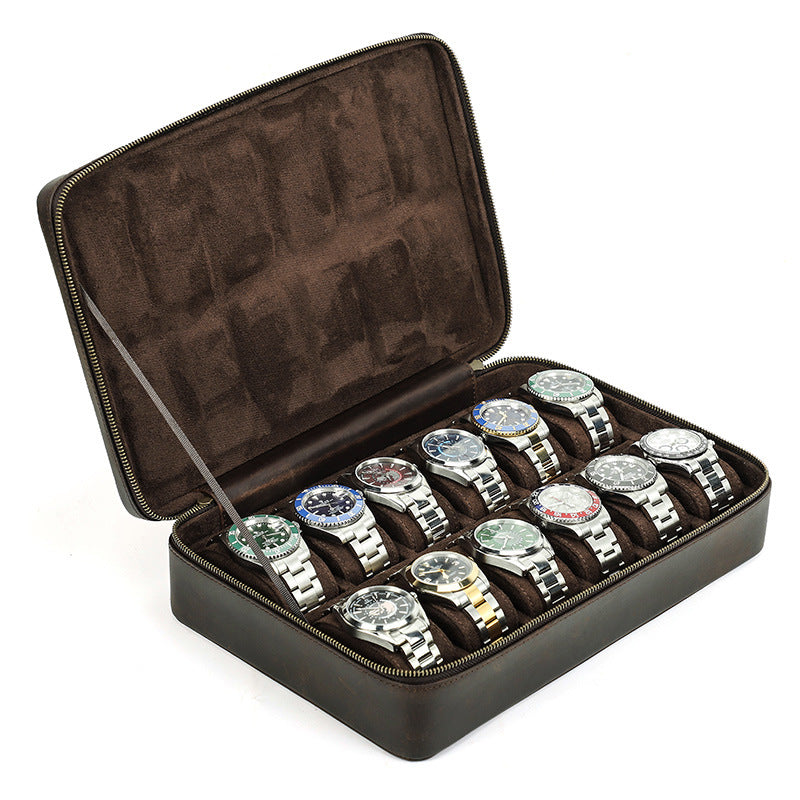 Set of silver watches in a brown display case on a white background