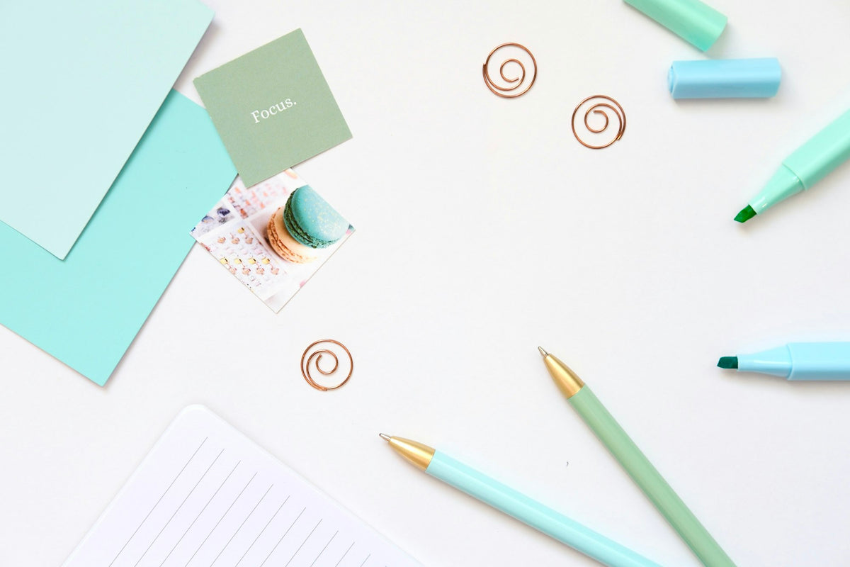 Mint and blue stationery flat lay banner